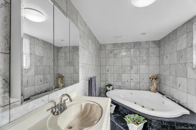 a bathroom with a sink and a bathtub