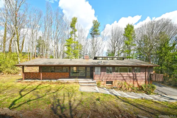 a view of a house with swimming pool