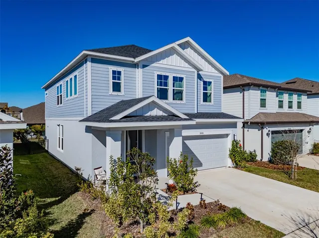 a view of a swimming pool with an outdoor seating