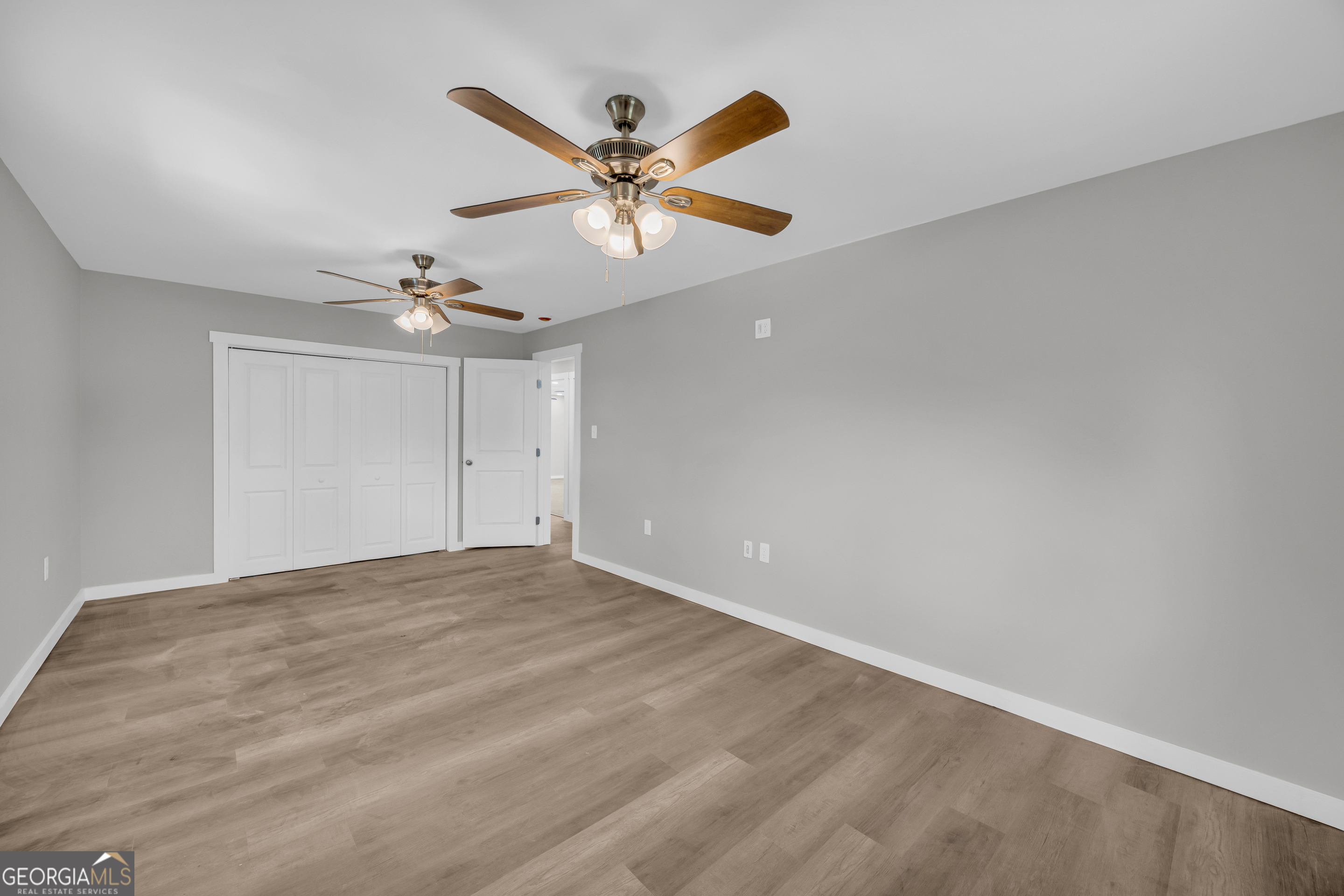 8606 Holly Springs Road Maysville, GA 30558 - Photo 58 of 74 a view of an empty room