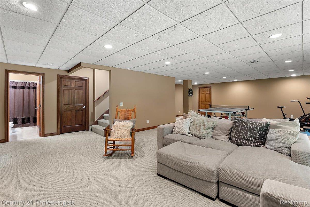 9867 Rainbow Ridge Drive Schoolcraft, MI 49087 - Photo 51 of 82 Carpeted lower level featuring recessed lighting, a drop ceiling, and a paneled wood door
