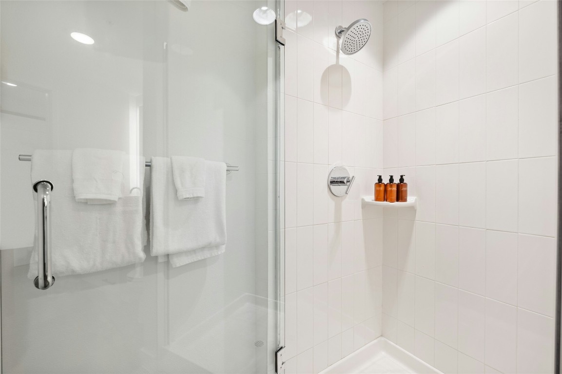 49 Navasota Street, Unit 214 Austin, TX 78702 - Photo 30 of 37 a bathroom with a shower