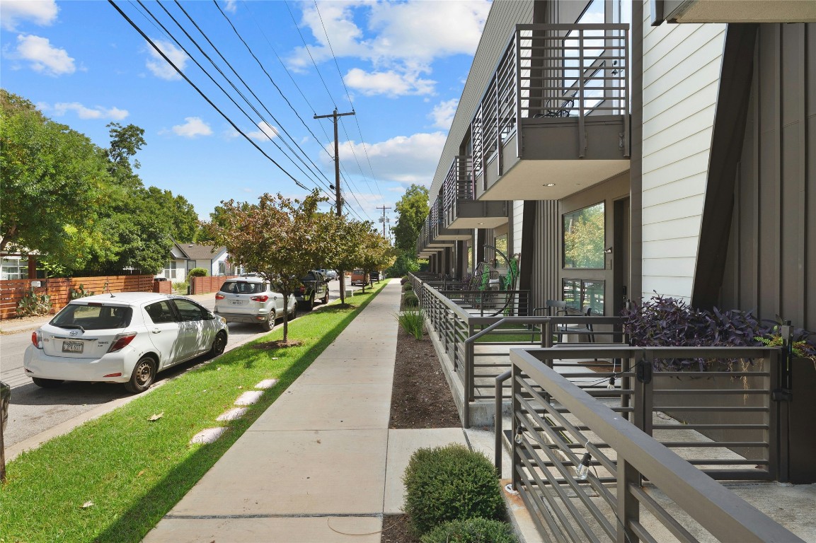 49 Navasota Street, Unit 214 Austin, TX 78702 - Photo 6 of 37 a view of multiple house with yard