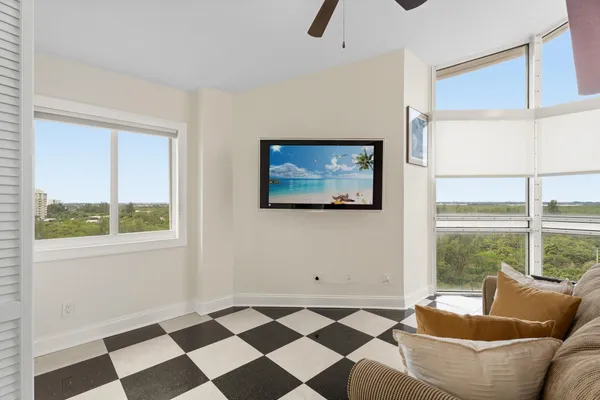 a living room with furniture and a window