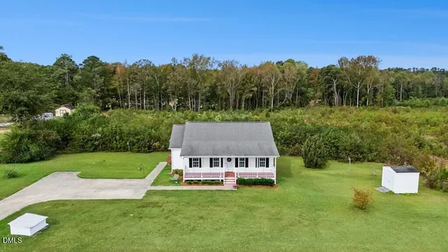 a view of a house with a big yard