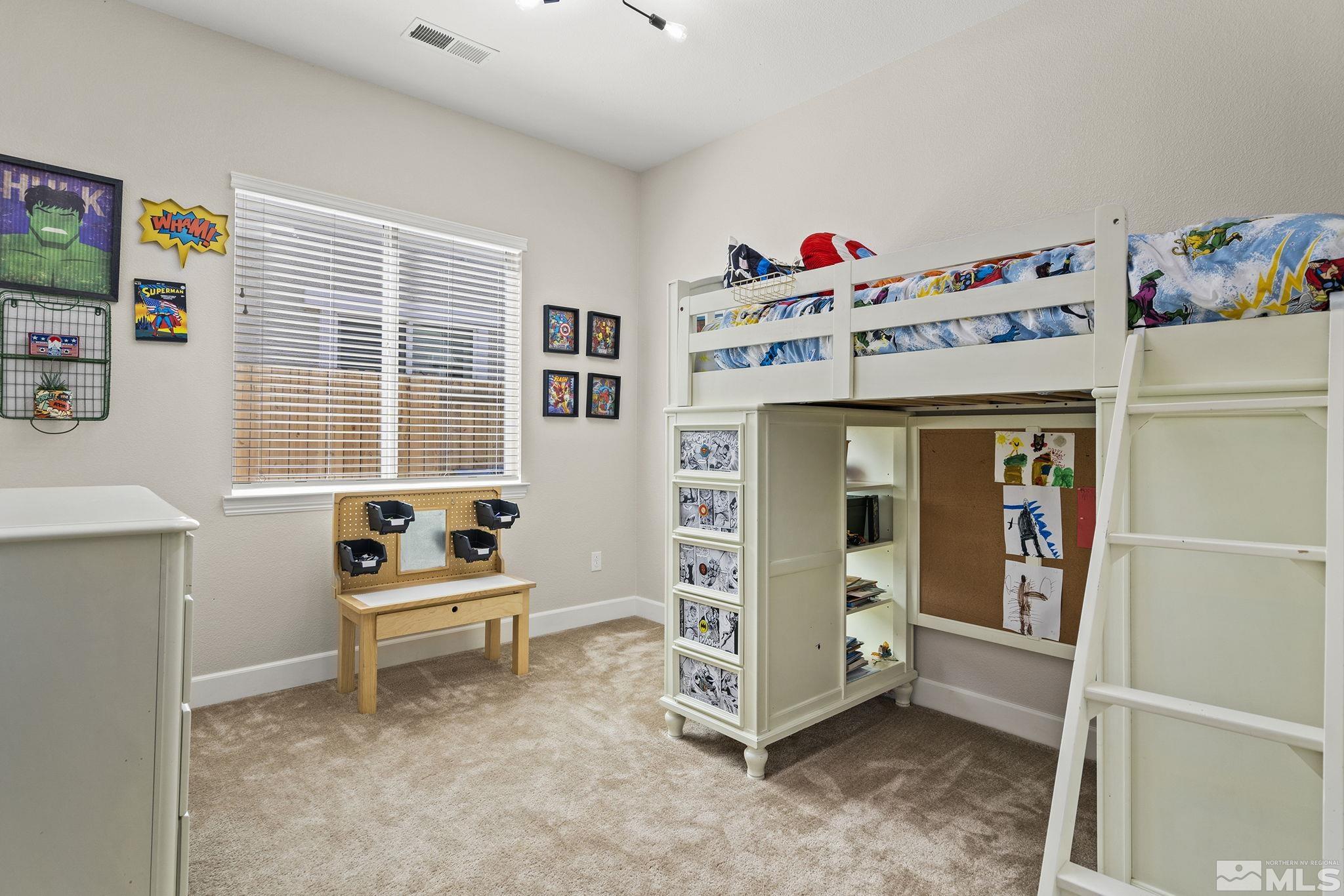 9716 Silverspar Street Reno, NV 89521 - Photo 28 of 40 a view of room with toys and workspace