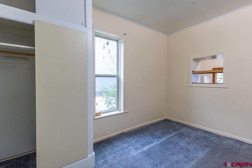 558 East 4th Avenue Durango, CO 81301 - Photo 3 of 15 an empty room with windows
