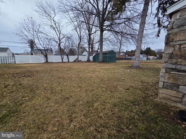 a view of yard covered with snow