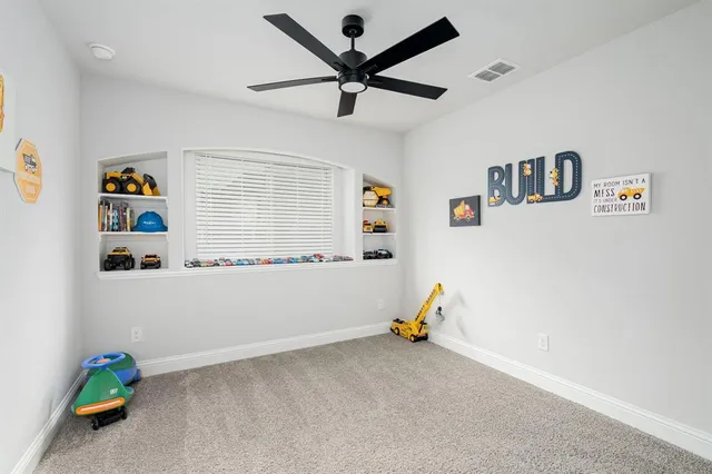 a room with furniture and a window