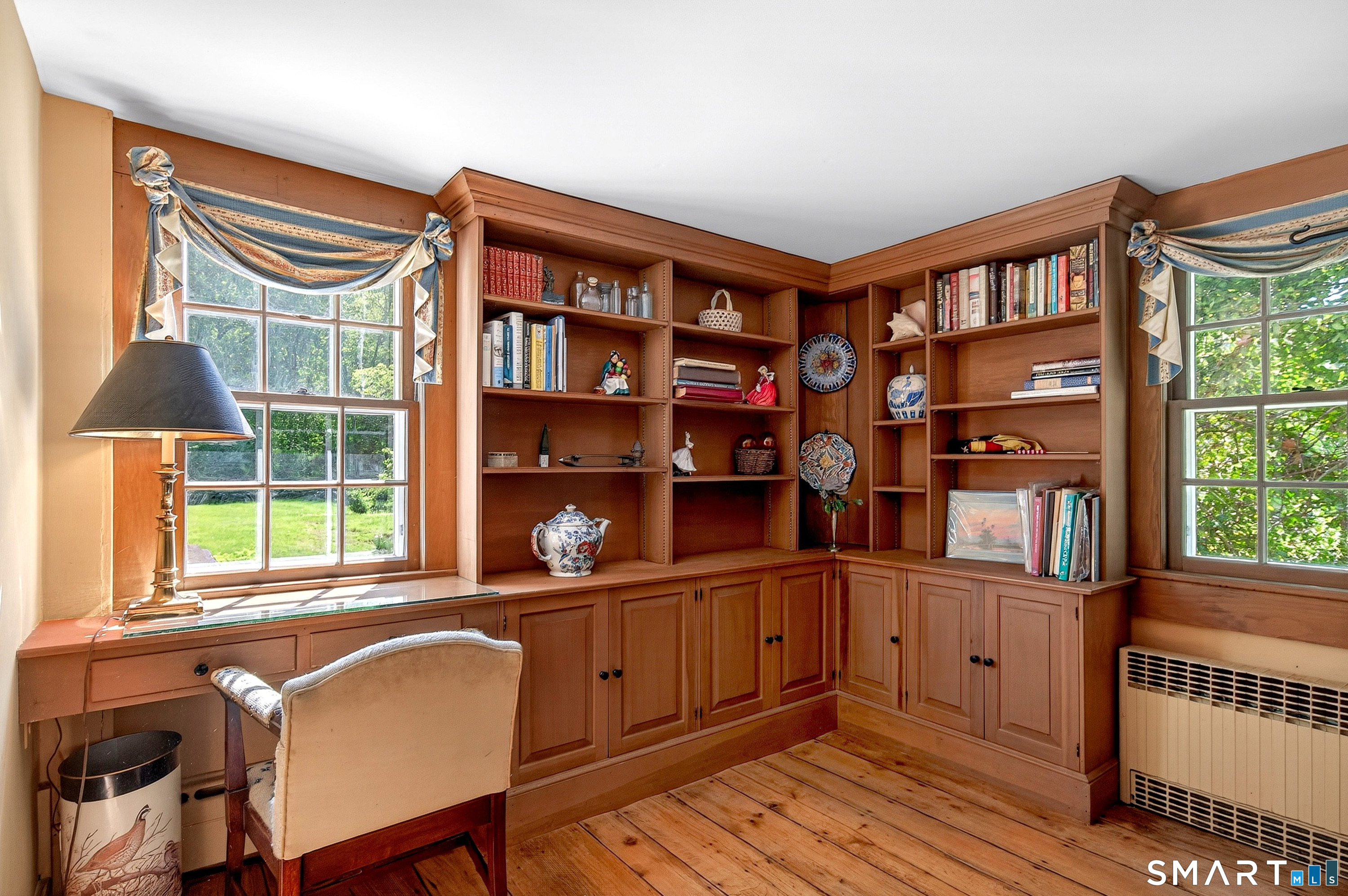 6 High Rock Road Newtown, CT 06482 - Photo 19 of 40 a view of a workspace with furniture and a window