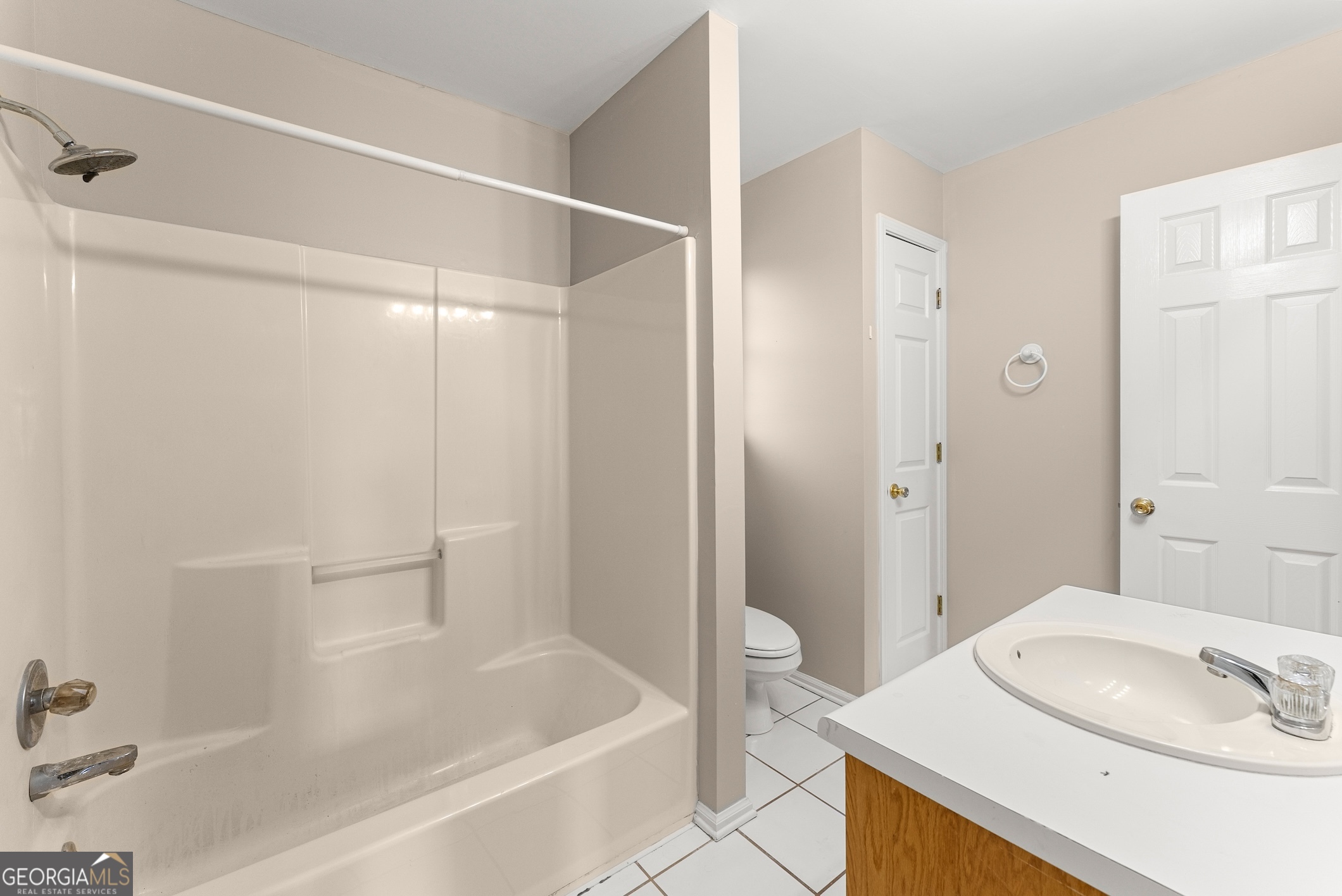 81 Heather Way Cleveland, GA 30528 - Photo 26 of 49 a bathroom with a sink and a mirror