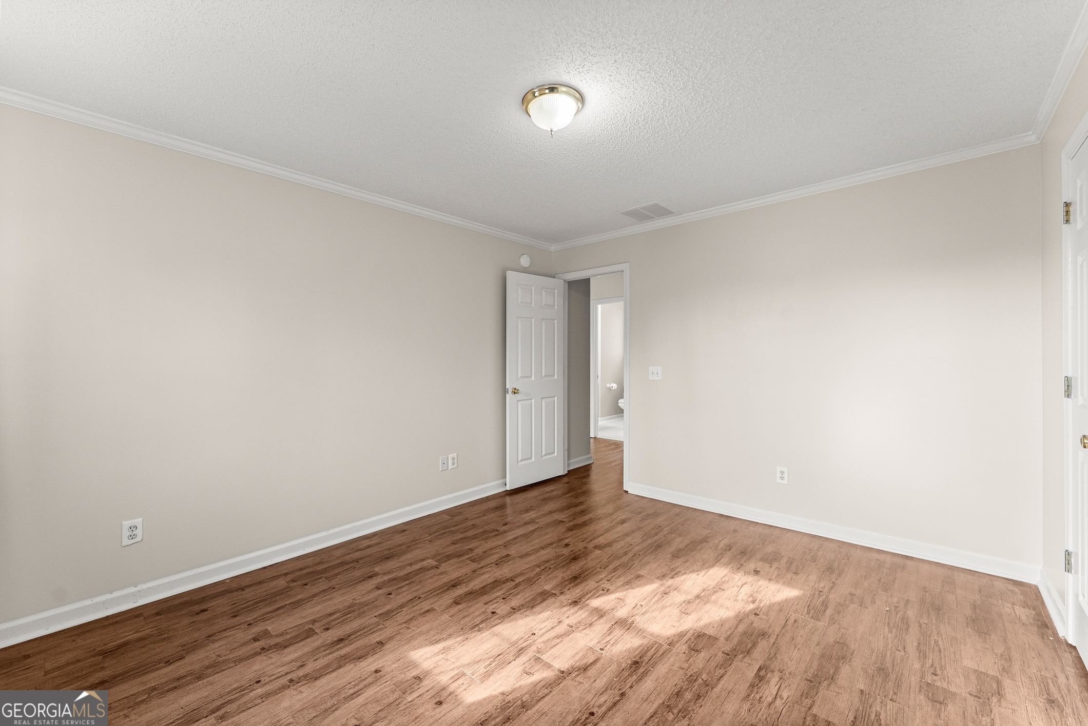 81 Heather Way Cleveland, GA 30528 - Photo 27 of 49 a view of an empty room with wooden floor