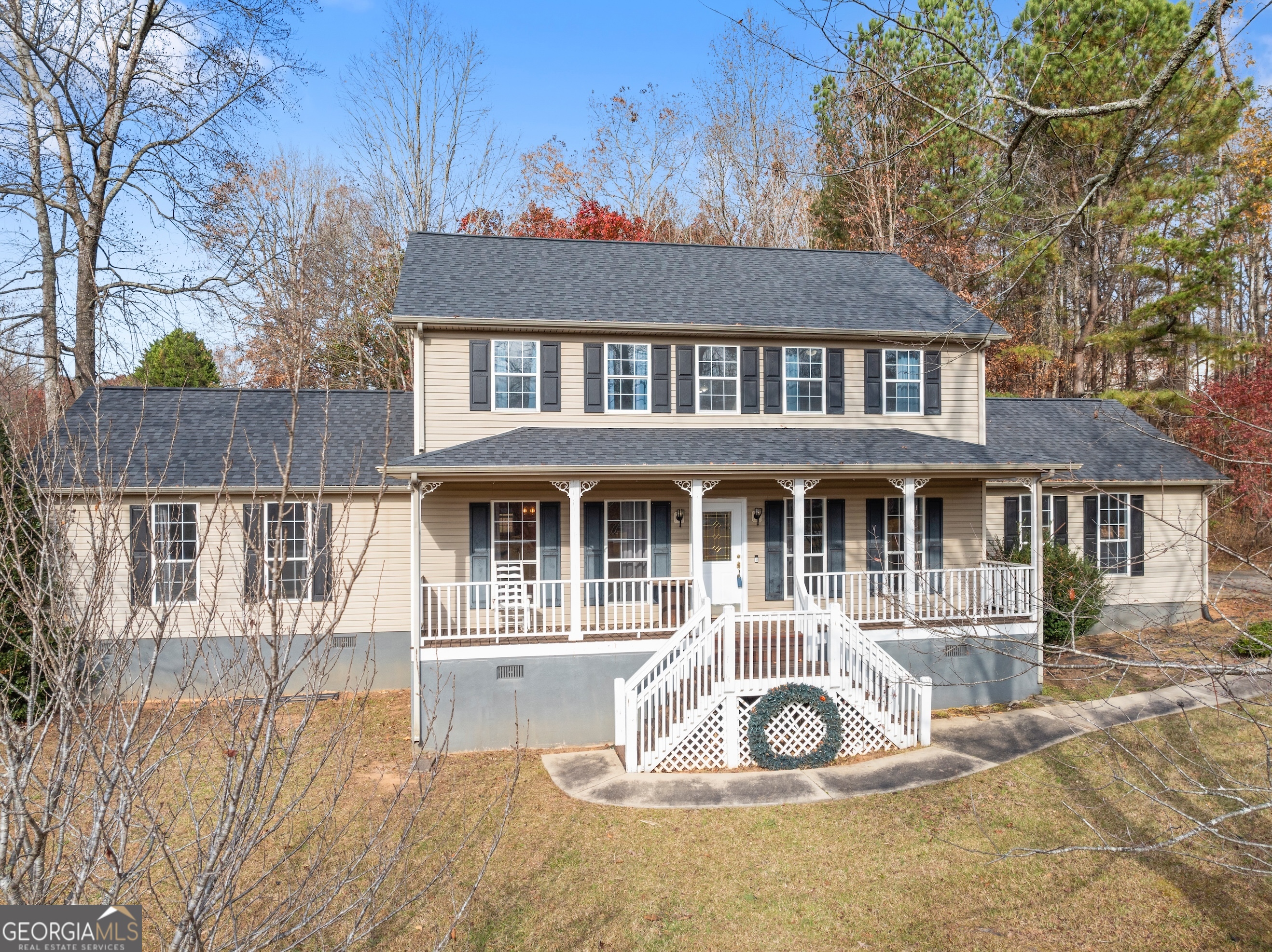 81 Heather Way Cleveland, GA 30528 - Photo 34 of 49 a front view of a house with a yard