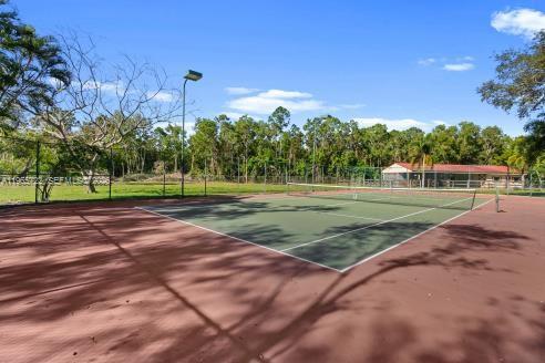 3761 Dellwood Road Loxahatchee, FL 33470 - Photo 26 of 55 Lighted tennis court