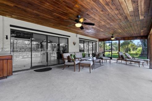 3761 Dellwood Road Loxahatchee, FL 33470 - Photo 30 of 55 Screened patio