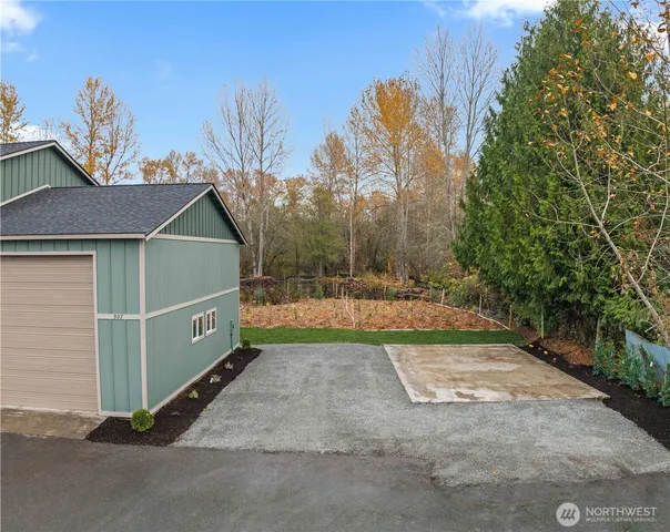 a view of backyard with green space