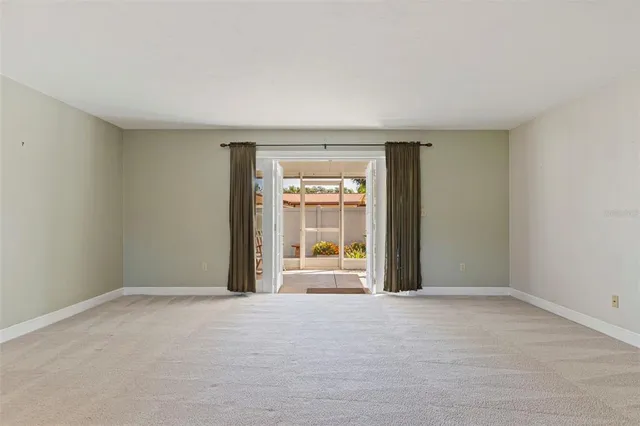 an empty room with window