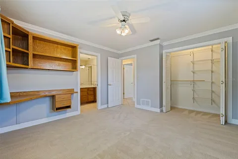 a bathroom with a granite countertop sink mirror toilet and bathtub