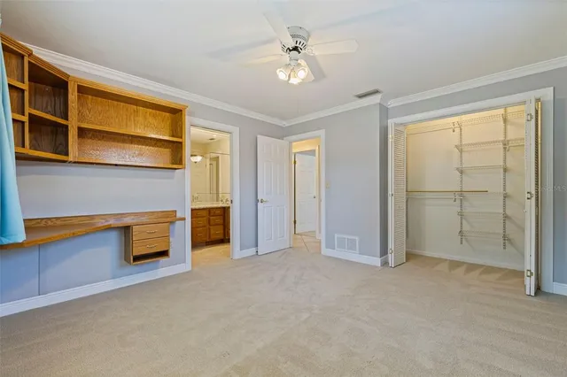 a bathroom with a granite countertop sink mirror toilet and bathtub