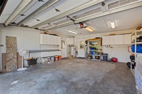 a view of a fountain in front of a house