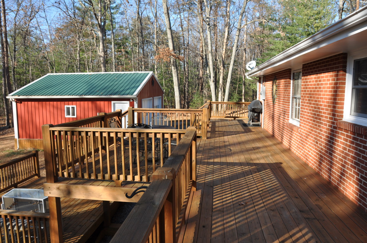 1153 Mead Valley Road Moneta, VA 24121 - Photo 15 of 35 Expansive Custom Built Deck