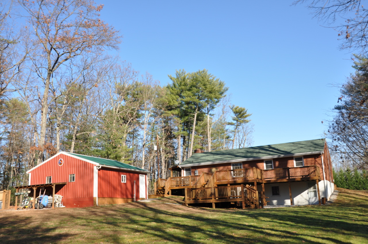 1153 Mead Valley Road Moneta, VA 24121 - Photo 7 of 35 Backyard View of House & Garage