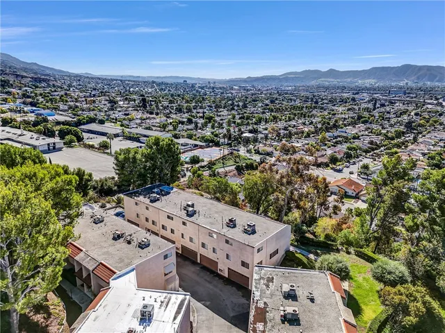 an aerial view of a city with lots of residential buildings