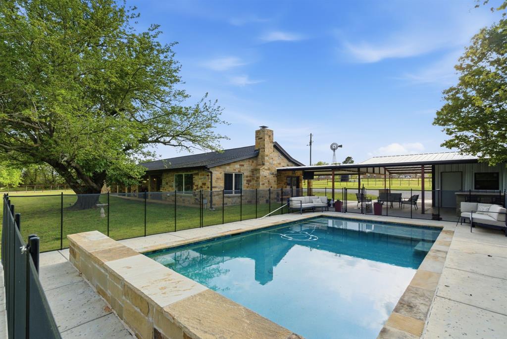 187 County Road 4195 Decatur, TX 76234 - Photo 3 of 40 a view of a house with swimming pool and sitting area