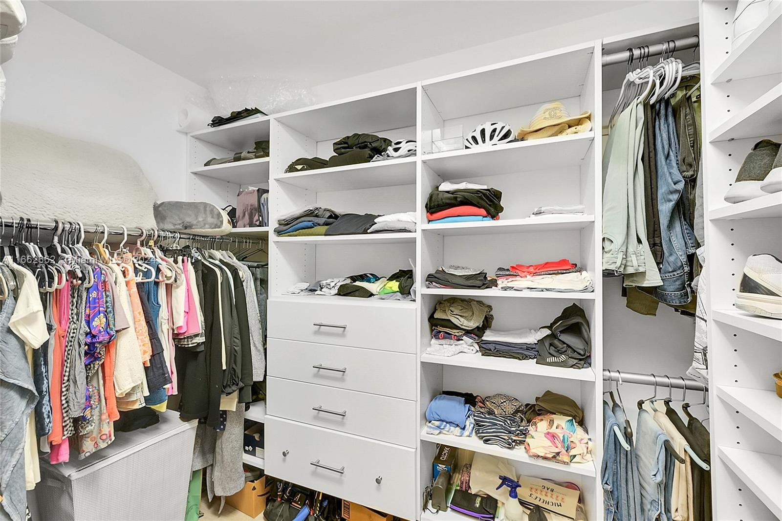 8913 Windtree Street Boca Raton, FL 33496 - Photo 14 of 30 Custom shelving in walk-in closet