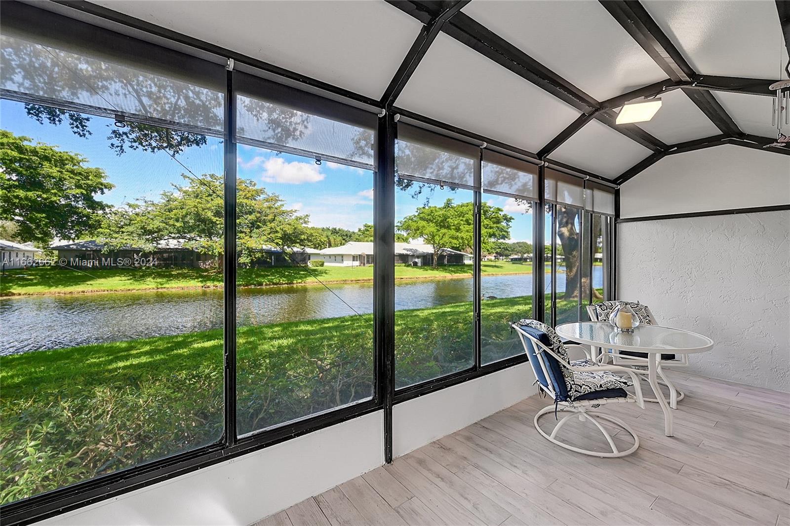 8913 Windtree Street Boca Raton, FL 33496 - Photo 20 of 30 Tranquil view of the lake from lanai
