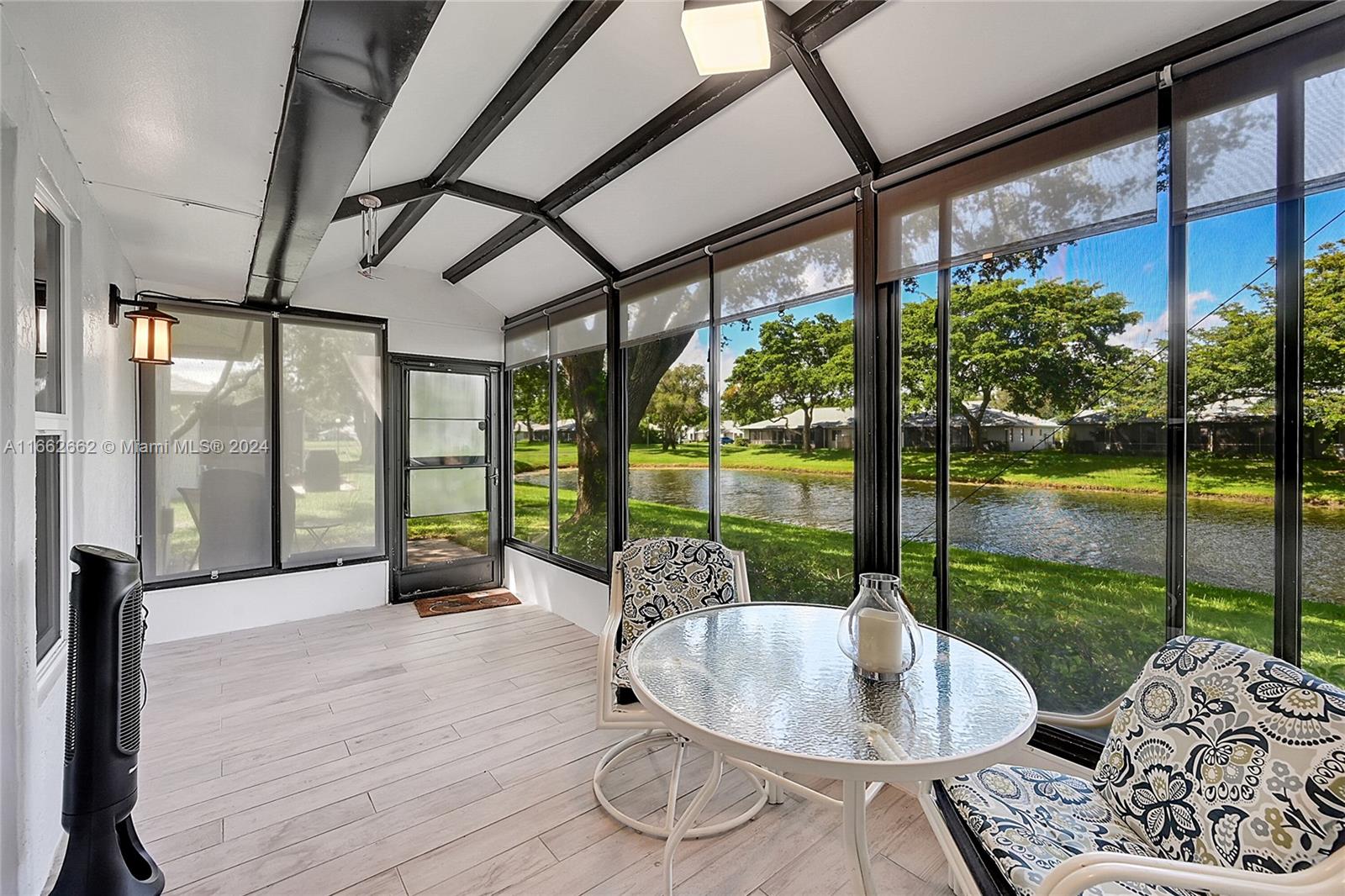 8913 Windtree Street Boca Raton, FL 33496 - Photo 21 of 30 Tranquil view of the lake from lanai