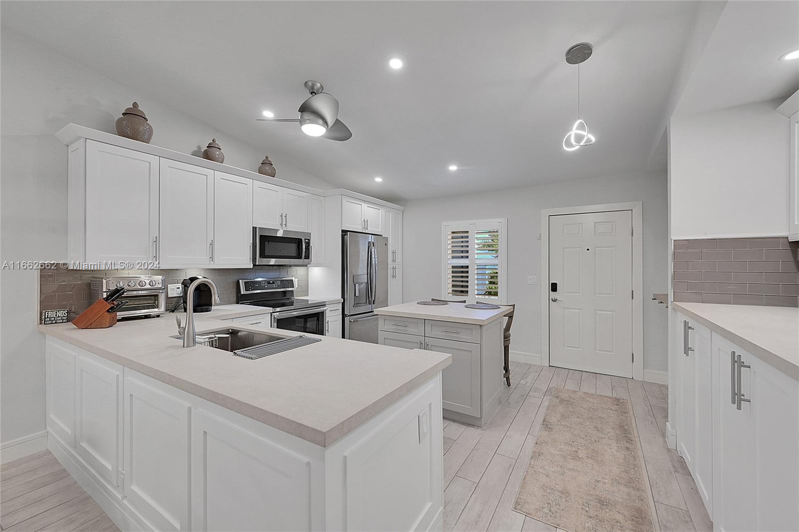 8913 Windtree Street Boca Raton, FL 33496 - Photo 5 of 30 Open kitchen