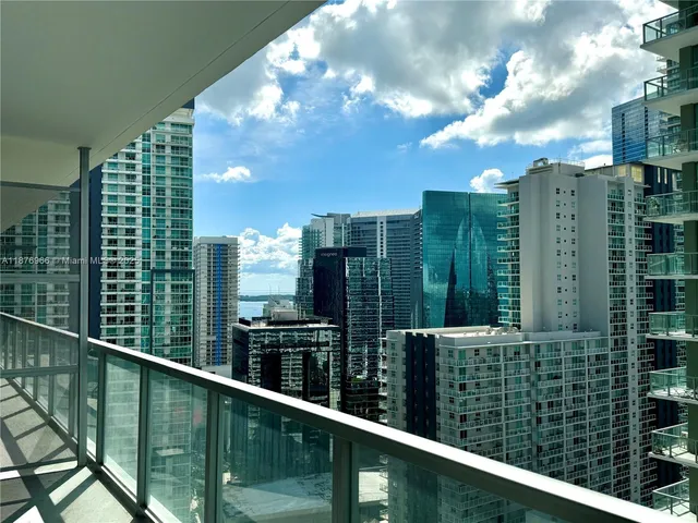 a view of a balcony with city view