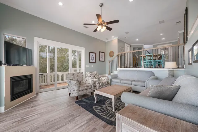 a spacious bedroom with a bed and a flat screen tv