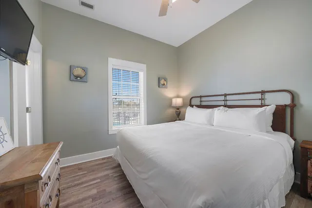 a bathroom with a sink a mirror and a shower