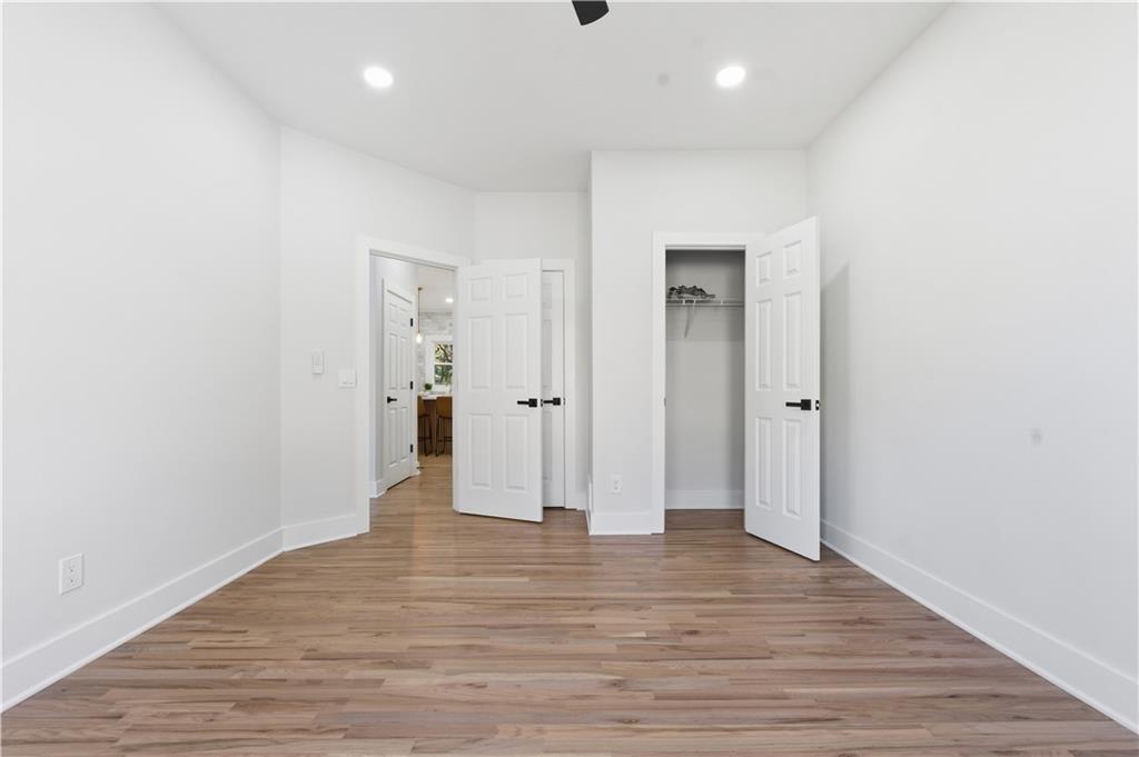 435 Lakepoint Trace Canton, GA 30114 - Photo 25 of 80 wooden floor in an empty room with wooden floor