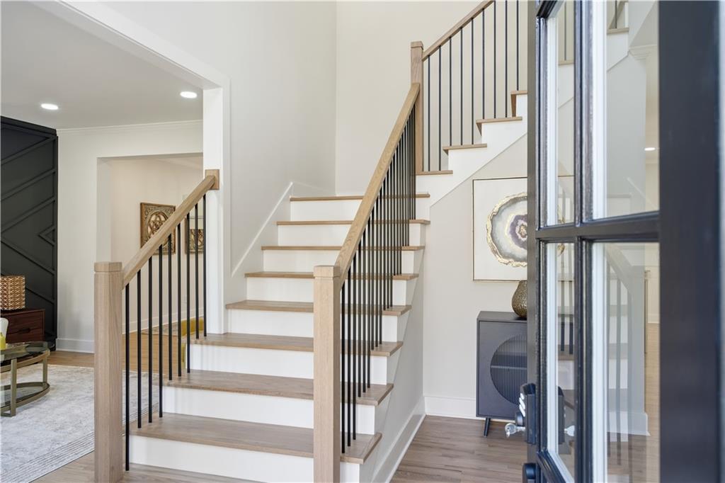 435 Lakepoint Trace Canton, GA 30114 - Photo 3 of 80 a view of entryway with wooden floor and windows