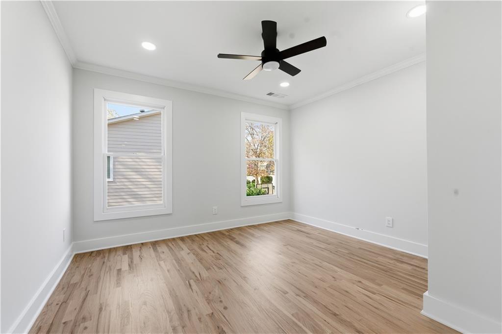 435 Lakepoint Trace Canton, GA 30114 - Photo 32 of 80 wooden floor in an empty room with a window