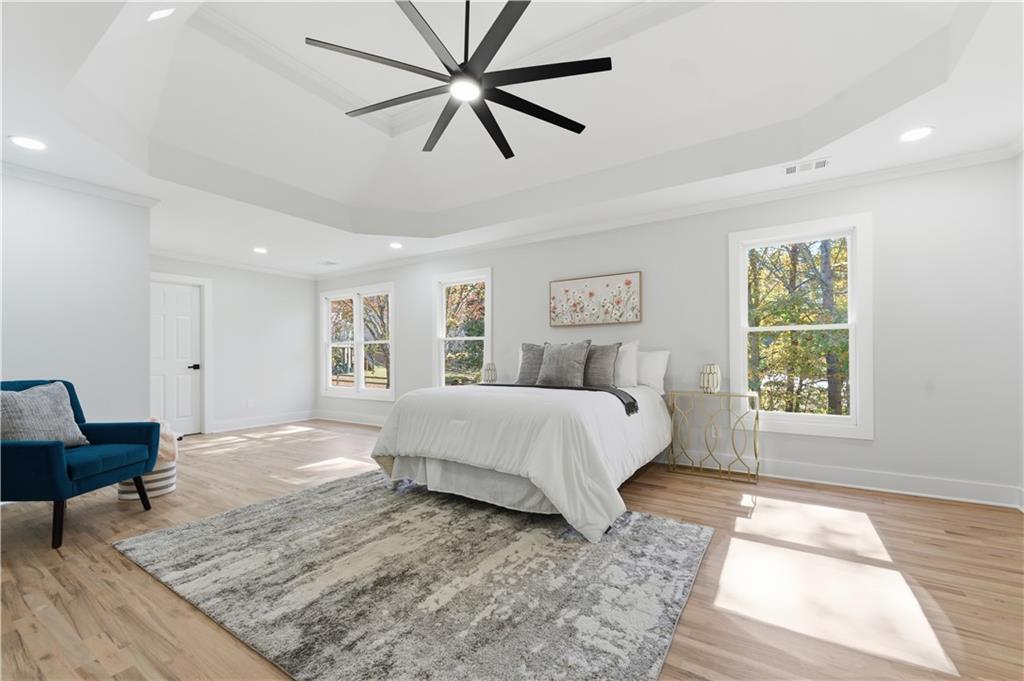 435 Lakepoint Trace Canton, GA 30114 - Photo 38 of 80 a spacious bedroom with a large bed and a window