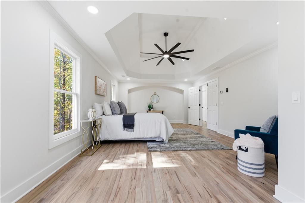 435 Lakepoint Trace Canton, GA 30114 - Photo 40 of 80 a living room with furniture and a window