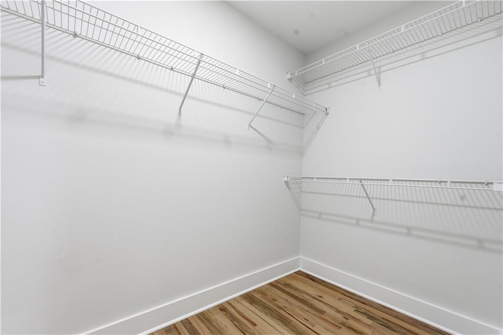 435 Lakepoint Trace Canton, GA 30114 - Photo 55 of 80 a view of a room with racks on the wall