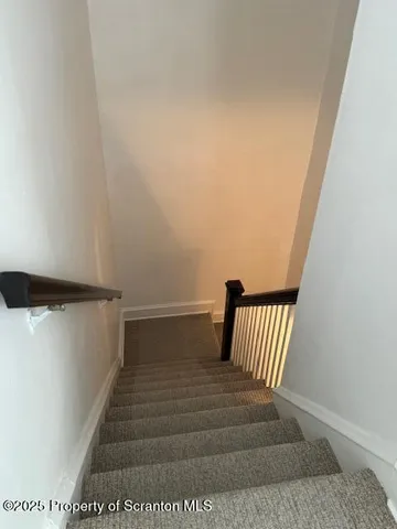 a view of a living room with furniture
