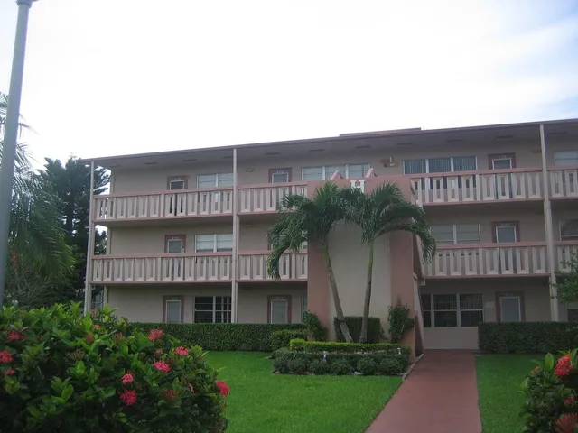 a view of a house with a garden