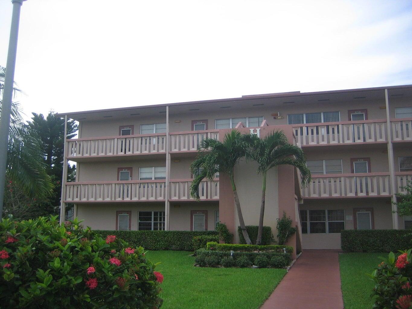 a view of a house with a garden