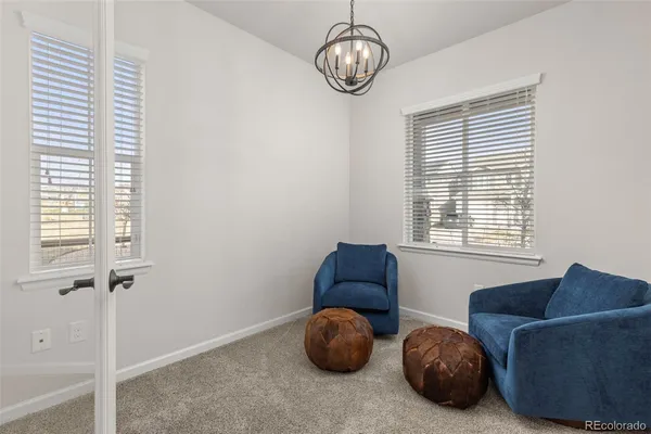 a room with furniture and a window