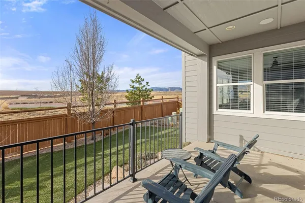 a balcony with an outdoor space