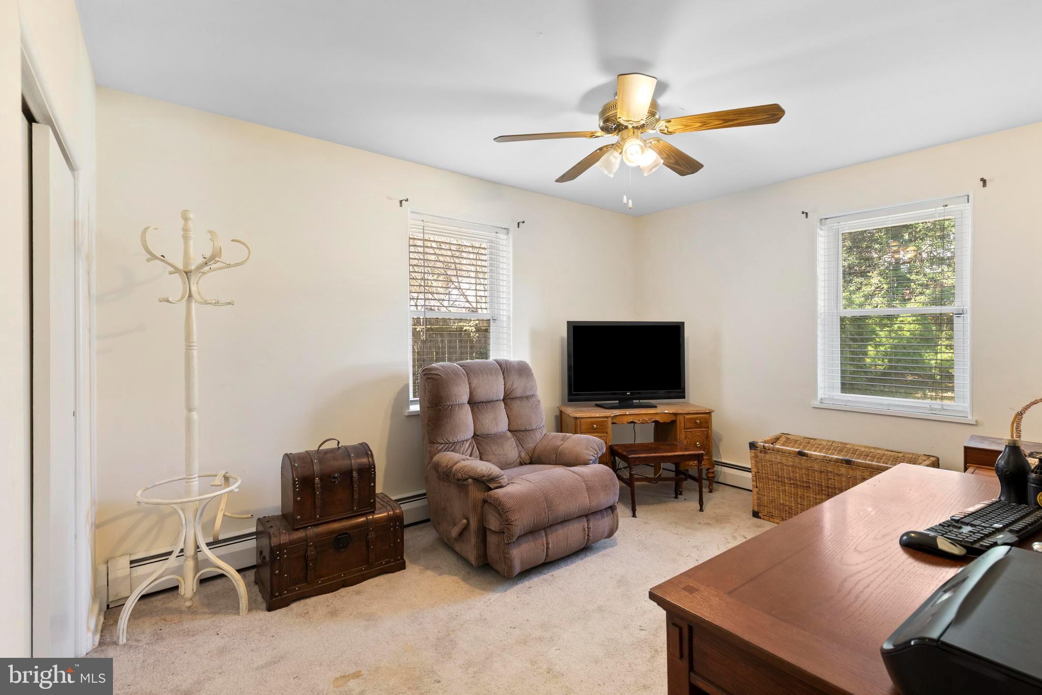 1001 Primos Avenue Secane, PA 19018 - Photo 15 of 27 a living room with furniture and a flat screen tv