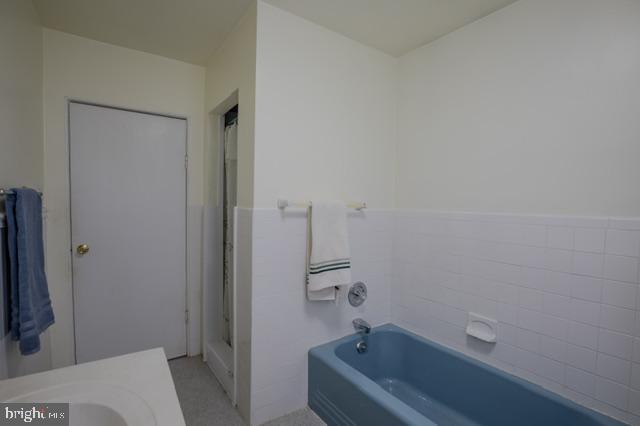 1001 Primos Avenue Secane, PA 19018 - Photo 17 of 27 a bathroom with a tub and sink