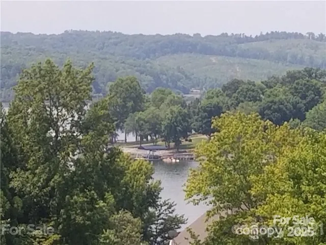 a view of a town with mountains in the background