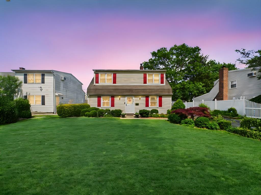 335 Loring Road Levittown, NY 11756 - Photo 1 of 1 Dutch colonial featuring a chimney